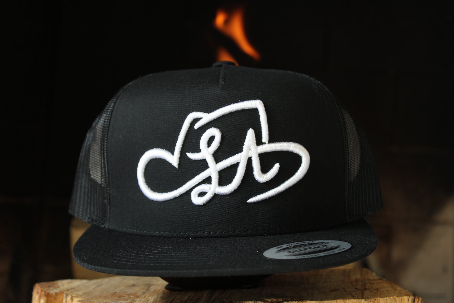 LA SHAPES LOGO BLACK TRUCKER HAT