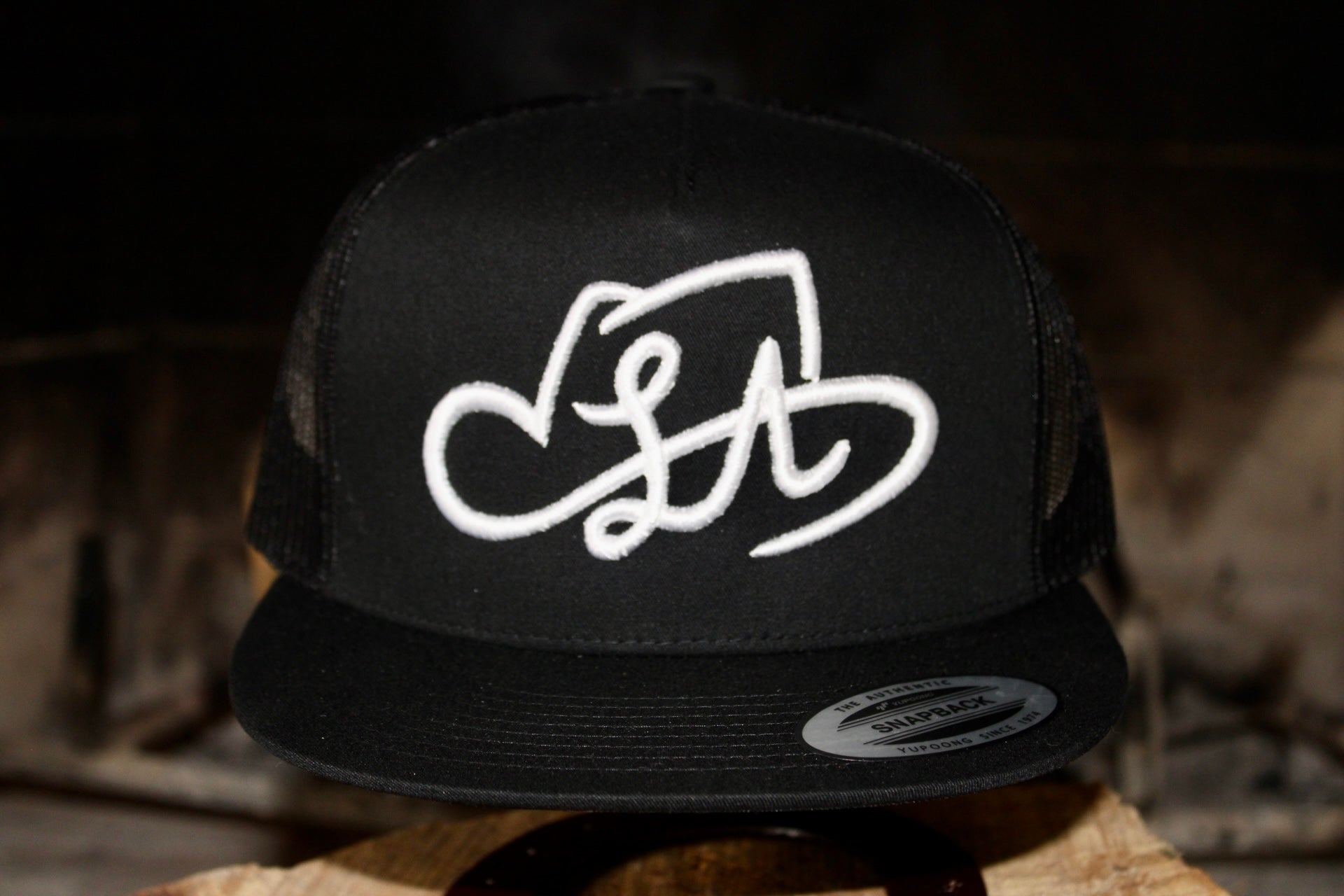 LA SHAPES LOGO BLACK TRUCKER HAT